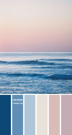 the ocean is full of blue and pink hues