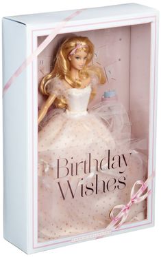 a barbie doll in a box with the words birthday wishes on it's back