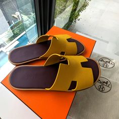 "Elevate Your Footwear Collection With These Hermes Men's Sandals In Size 45. These Luxury Sandals Are In Great Condition, Combining Style And Comfort Effortlessly. Step Into Elegance With Hermes. #Hermesfootwear #Luxurysandal" Yellow Flat Sandals With Rubber Sole, Yellow Open Toe Slides With Rubber Sole, Yellow Slip-on Slides With Removable Insole, Yellow Cushioned Slides With Round Toe, Yellow Slides With Rubber Sole And Round Toe, Yellow Slides With Round Toe And Rubber Sole, Designer Yellow Sandals For Beach, Designer Yellow Sandals For The Beach, Yellow Leather Sole Slip-on Sandals