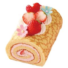 a rolled up cake with strawberries on top