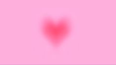 a heart shaped object on a pink background