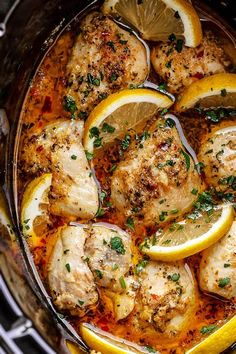 chicken with lemons and herbs in a slow cooker