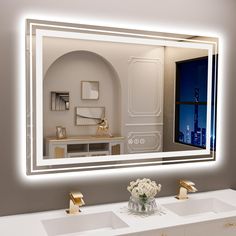 a bathroom with two sinks and a large mirror on the wall above it's lights