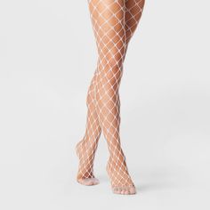 Elevate your look this season with the Women's Large Net Tights from A New Day™ in Black. A slightly sheer design with a fishnet pattern, these stunning tights add a playful vibe to your outfit. They are not only super cute but also very trendy, making them a must-have piece in your wardrobe. Pair them with skirts or even shorts to transform a basic outfit into a stylish one. Style that goes wherever you do. Fish Net Tights, Dark Skirts, Net Tights, White Fishnets, Floral Tights, Fishnet Leggings, Rave Fits, Cute Tights, Size 16 Women