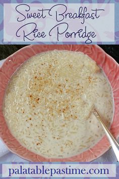 a pink plate topped with rice pudding and a spoon