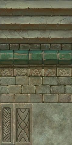 an animal standing on top of a stone wall next to a green and brown fence