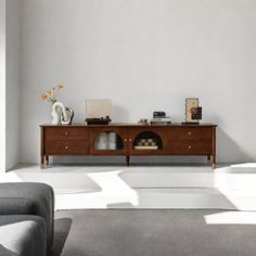 a living room scene with focus on the sofa and coffee table in the center area