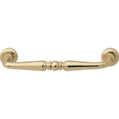 a gold door handle on a white background