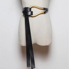 Upgrade your fashion game with our stunning black leather tie belt! Made from premium-quality leather, the soft and durable material offers a comfortable and stylish fit. The gold-tone belt buckle adds a touch of luxury and elegance to any outfit, making it perfect for both formal and casual occasions. Whether you're dressing up or down, our belt has got you covered. Women Belts Fashion, Big Buckle Belt, Shirt Knot, Woman Personality, Layered Fashion, Wrap Belt, Faux Leather Belts, Fashion Pattern, Leather Belts