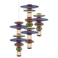 a multicolored bird feeder hanging from the ceiling