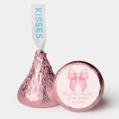 a herss candy bar with a pink bow on it