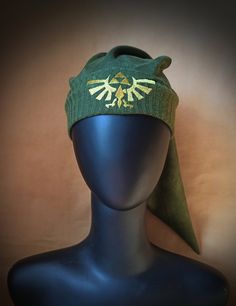 Link hat made of high-quality green fabric, with logo embroidered in gold thread. I made it respecting the comfort and the genuine aspect of the video game. If you have any questions you can write to me and I will gladly help you. Link Hat, Legend Of Zelda Link, Zelda Cosplay, Majoras Mask, Gold Thread, Costume Hats, Breath Of The Wild, Write To Me, Gold Threads