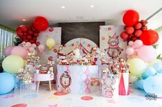 a birthday party with balloons and decorations