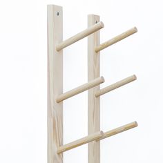 a wooden ladder that is made out of wood and has four bars on each side