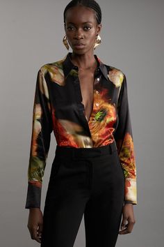 Elevate Your Every Day Wardrobe With A Unique Button Up Shirt. The Smooth, Shimmering Satin Makes A Statement No Matter Where You'Re Headed, While The Collar And Button Down Design Elevates The Formality. Catch Eyes With The Vibrant, Floral Print, Especially When Paired With The Matching Separates. Style It With Failsafe Jeans Or The Matching Trousers And Strappy Heels For An Occasion Look That Is Guaranteed To Turn Heads. Floral Satin Woven Shirt High Quality, Slinky Satin Fabric Elevated, Clas Bride Jumpsuit, Petite Wedding Guest Dresses, Plus Size Satin, Plus Size Workwear, Summer Bridesmaid Dresses, Matching Separates, Italy Outfits, Outfits Petite, Wedding Guest Dress Summer