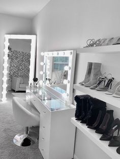 there is a vanity with shoes on it and a mirror in the corner next to it