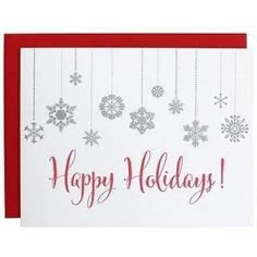 a happy holiday card with snowflakes hanging from it