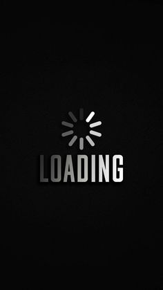 the loading sign is lit up in the dark with white letters on black background, which reads loading