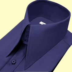 High Long Pointed Collar Tailor-Made On Order shirt 𝘈 𝘸𝘩𝘪𝘵𝘦 𝘩𝘪𝘨𝘩-𝘤𝘰𝘭𝘭𝘢𝘳 𝘴𝘩𝘪𝘳𝘵 𝘪𝘴 𝘢 𝘤𝘭𝘢𝘴𝘴𝘪𝘤 𝘢𝘯𝘥 𝘵𝘪𝘮𝘦𝘭𝘦𝘴𝘴 𝘸𝘢𝘳𝘥𝘳𝘰𝘣𝘦 𝘴𝘵𝘢𝘱𝘭𝘦 𝘵𝘩𝘢𝘵 𝘦𝘹𝘶𝘥𝘦𝘴 𝘴𝘰𝘱𝘩𝘪𝘴𝘵𝘪𝘤𝘢𝘵𝘪𝘰𝘯 𝘢𝘯𝘥 𝘦𝘭𝘦𝘨𝘢𝘯𝘤𝘦. 𝘛𝘩𝘪𝘴 𝘵𝘺𝘱𝘦 𝘰𝘧 𝘴𝘩𝘪𝘳𝘵 𝘧𝘦𝘢𝘵𝘶𝘳𝘦𝘴 𝘢 𝘤𝘰𝘭𝘭𝘢𝘳 𝘵𝘩𝘢𝘵 𝘴𝘵𝘢𝘯𝘥𝘴 𝘶𝘱 𝘢𝘯𝘥 𝘦𝘯𝘤𝘪𝘳𝘤𝘭𝘦𝘴 𝘵𝘩𝘦 𝘯𝘦𝘤𝘬, 𝘱𝘳𝘰𝘷𝘪𝘥𝘪𝘯𝘨 𝘢 𝘳𝘦𝘧𝘪𝘯𝘦𝘥 𝘢𝘯𝘥 𝘱𝘰𝘭𝘪𝘴𝘩𝘦𝘥 𝘭𝘰𝘰𝘬. 𝘛𝘩𝘦 𝘤𝘳𝘪𝘴𝘱 𝘸𝘩𝘪𝘵𝘦 𝘤𝘰𝘭𝘰𝘳 𝘰𝘧 𝘵𝘩𝘦 𝘴𝘩𝘪𝘳𝘵 𝘪𝘴 𝘷𝘦𝘳𝘴𝘢𝘵𝘪𝘭𝘦 𝘢𝘯𝘥 𝘱𝘢𝘪𝘳𝘴 𝘸𝘦𝘭𝘭 𝘸𝘪𝘵𝘩 𝘢 𝘷𝘢𝘳𝘪𝘦𝘵𝘺 𝘰𝘧 𝘴𝘵𝘺𝘭𝘦𝘴 𝘢𝘯𝘥 𝘤𝘰𝘭𝘰𝘳𝘴, 𝘮𝘢𝘬𝘪𝘯𝘨 𝘪𝘵 𝘢𝘯 𝘪𝘥𝘦𝘢𝘭 𝘤𝘩𝘰𝘪𝘤𝘦 𝘧𝘰𝘳 𝘣𝘰𝘵𝘩 𝘧𝘰𝘳𝘮𝘢𝘭 𝘢𝘯𝘥 𝘤𝘢𝘴𝘶𝘢𝘭 𝘰𝘤𝘤𝘢𝘴𝘪𝘰𝘯𝘴. 𝘛𝘩𝘦 𝘴𝘩𝘪𝘳𝘵 𝘪𝘴 𝘵𝘺𝘱𝘪𝘤𝘢𝘭𝘭𝘺 𝘮 Navy Elegant Business Shirt, Elegant Navy Business Shirt, Classic Navy Slim Fit Shirt, Navy Classic Slim Fit Shirt, Elegant Navy Dress Shirt For Formal Occasions, Elegant Navy Office Shirt, Classic Navy Shirt For Formal Occasions, Classic Navy Dress Shirt For Formal Occasions, Classic Navy Formal Shirt