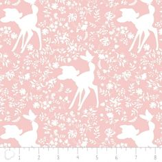 a pink background with white deers and flowers on the bottom right corner, in front of a ruler