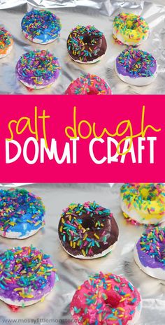 colorful donuts with sprinkles on them are displayed in front of a pink sign that says, salt dough donut craft