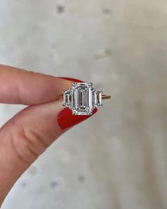 ITEM INFORMATION:✦ Main Stone Details ✧ Shape: Emerald Cut Moissanite ✧ Weight: 3.00 CT (App.) ✧ Dimension: 7.0 x 10.0 MM (App.) ✧ Color: G-H (Near Colorless) ✧ Clarity: VVS ✦ Side Stone Details ✧ Shape: Trapezoid Cut Moissanite ✧ Weight: 1.00 CT (App.) ✧ Color: G-H (Near Colorless) ✧ Clarity: VVS ✦ Ring Details ✧ Band Width: 1.50 mm (± 0.10) [Customized Possible]✧ Metal: Gold 10KT , 14KT , 18KT , Silver 925 Sterling✧ Metal Tone: Yellow, White, Rose ✧ Stamp/Hallmark: Yes ✧ Engraving: Free (Pleas Trendy Silver Jewelry, Swirl Engagement Rings, Moissanite Bridal Sets, Emerald Cut Engagement, Emerald Cut Moissanite, Emerald Cut Rings, Emerald Engagement Ring Cut, Lab Grown Diamonds Engagement, Gemstone Engagement