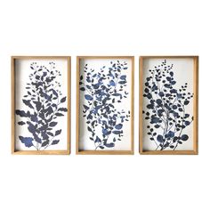 three framed art pieces with blue flowers in them