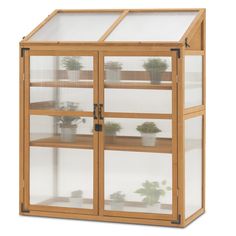 PRICES MAY VARY. Large Cold Frame: This greenhouse has a large size to provide enough space to organize your plants and small planting tools. (Overall Dimension: 44.5" x 24.8" x 55.4") 2 Adjustable Shelf: The shelves of this garden cold frame could be freely adjusted height to fit various types of plants, which meets all your needs. Openable Roof: The bolts on the greenhouse frame kit sides could be used to fix the roofs and keep them open to provide a healthy ventilation system for your plants Garden Cold Frame, Greenhouse Large, Greenhouse Cabinet, Greenhouse Benches, Wooden Greenhouse, Cold Frame Greenhouse, Greenhouse Frame, Planting Tools, Wooden Greenhouses