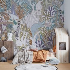 a child's room with an animal themed wallpaper and wooden toys on the floor