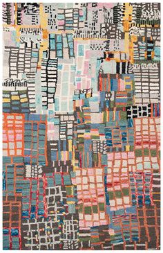 an abstract rug with multicolored squares and lines