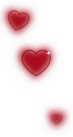 three red hearts floating in the air on a white background