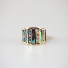 The take of unique abalone brings luster to this striped mother of pearl ring. A classic and modern piece made for everyday wear. This ring has a white version: Striped Mother of Pearl Ring 18k gold plated Stainless steel base Waterproof and tarnish free Available in US size 6-8 Ring sizing chart Diy Wire Jewelry Rings, Abalone Ring, Dope Jewelry Accessories, Wire Jewelry Rings, Mother Of Pearl Ring, Mermaid Ring, Mother Of Pearl Jewelry, Hand Accessories, Gemstone Necklaces