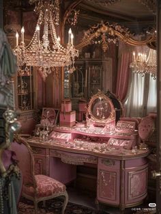 a pink vanity with chandelier and mirror