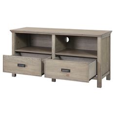 an entertainment center with two drawers and one door on the bottom, in grey wood