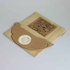 a brown paper bag with a cd in it