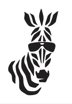 the head of a zebra with glasses on it's face