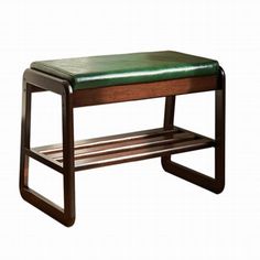 a wooden bench with a green leather seat on it's backrest and legs