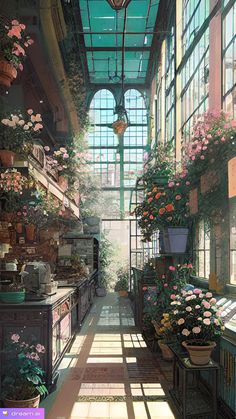 the inside of a flower shop with lots of potted plants