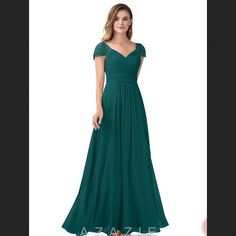 a woman wearing a long green dress with short sleeves and a v - neckline