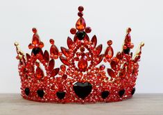 For adults, not suitable for children.  This HUGE crown is too heavy for children.   The crown is adorned with glass rhinestones, crystal beads, and resin hearts on a gold base.  There are loop ends to attach your crown with pins or elastic.   The crown weighs 13.5 ounces (nearly a pound).  The diameter across is 6.5 inches.  It is 5 inches tall at its highest point.   Ships in a box for safe travels! Shipping Details: All items will be shipped First Class by the United States Postal Service. An Queen Of Hearts Quinceanera Theme, Queen Of Hearts Descendants, Queen Of Hearts Crown, Y2k Baddie Aesthetic, Resin Hearts, Red Cosplay, Crown Aesthetic, Lizzie Hearts, Queen Of Hearts Costume