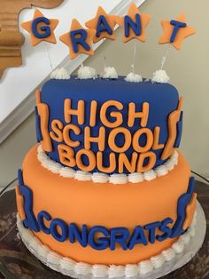 there is a cake that says high school bound on the top and bottom tiers