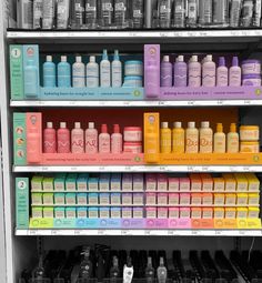 the shelves are filled with different types of hair care products