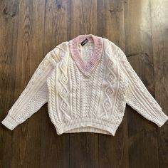 Vintage 1990s Chunky Thick Cable Knit Pink Collar V-Neck Sweater / made in USA / size Large Pit to Pit:    21" Length:    25" Sleeve:   27" Runs smaller. Please check the measurements before purchasing. -------------------------------- ⚠️ Please Note: All of our items are vintage. Please note that with vintage clothing, items may show some signs of wear. We do our best to include as much information about the items condition as possible. Please look carefully through the photos and feel free to Oversized V-neck Cable Knit Sweater, Vintage V-neck Cable Knit Sweater, Vintage Cotton V-neck Sweater, Pink Cable Knit V-neck Tops, Pink Soft Knit V-neck Sweater, Rare Clothing, Pink Collar, Pink Collars, Sweater Making