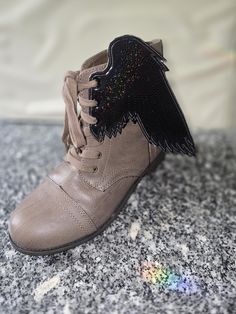 This listing is for a pair of wings,  black glitter holographic Raven with detailed embroidered wings 6.85 inches high to tip of wing These lace onto boots or skates with the shoe laces thru matching eyelets on the shoes. Wings For Shoes, Wings Black, Roller Skate, Roller Skates, Roller Skating, Black Glitter, Circus, Shoe Laces, Shoe Accessories