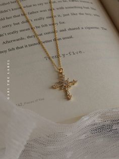 An intricate cross necklace with love and religion at its heart.

Gold base colour
Gold chain: Gold plating over 925 Sterling Silver
Cross charm: 18K Gold plating over copper, cubic zirconia


Measurements. Length 45cm. Charm 1.7cm by 2cm. Gold-plated Cross Necklace With Adjustable Chain, Gold Plated Cross Necklace With Adjustable Chain, Gold Cubic Zirconia Crucifix Necklace, Gold Cubic Zirconia Pendant Cross Necklace, Gold Cubic Zirconia Cross Necklace As A Gift, Gold Cubic Zirconia Cross Necklace, Rose Gold Cubic Zirconia Cross Necklace, Gold Cross Necklace With Cubic Zirconia, Dainty Cubic Zirconia Cross Necklace