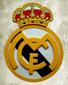 the emblem of real madrid is displayed on a wall