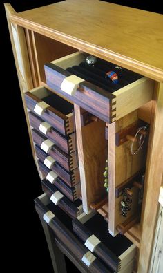 a wooden cabinet filled with lots of drawers