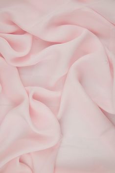 Baby Pink Silk Double Georgette Fabric is a remarkably durable, lightweight premium silk that offers an extremely graceful drape and a soft, dull finish. This fabric is ideal for blouses, gowns, dresses, and overlays. The fabric's soft, airy appearance also makes it suitable for scarves and other accessories. The fabric is sold by the Yard, and measures 44 inches in width. Baby Pink Silk, Draping Fabric, Spring Event, Dupioni Silk, Pink Chiffon, Georgette Fabric, Silk Wool, Pink Outfits, Pink Silk