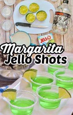 margarita jello shots on a tray with limes