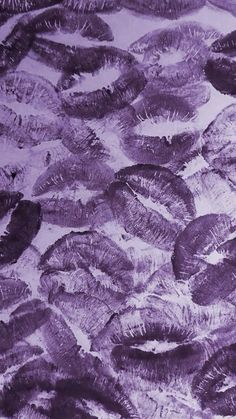 an image of purple feathers that are in the air